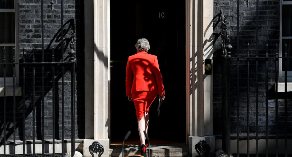 British Prime Minister Theresa May leaves after announcing her resignation.