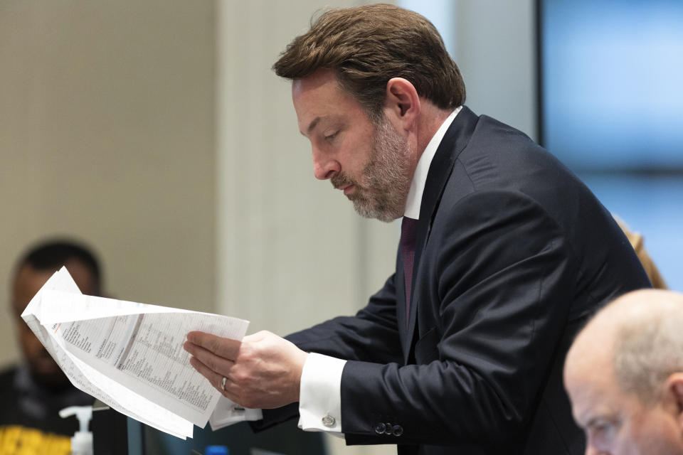 Defense attorney Phillip Barber reviews a spreadsheet being put into evidence during Alex Murdaugh's trial for murder at the Colleton County Courthouse in Walterboro, S.C., on Wednesday, Feb. 1, 2023. (Joshua Boucher/The State via AP, Pool)