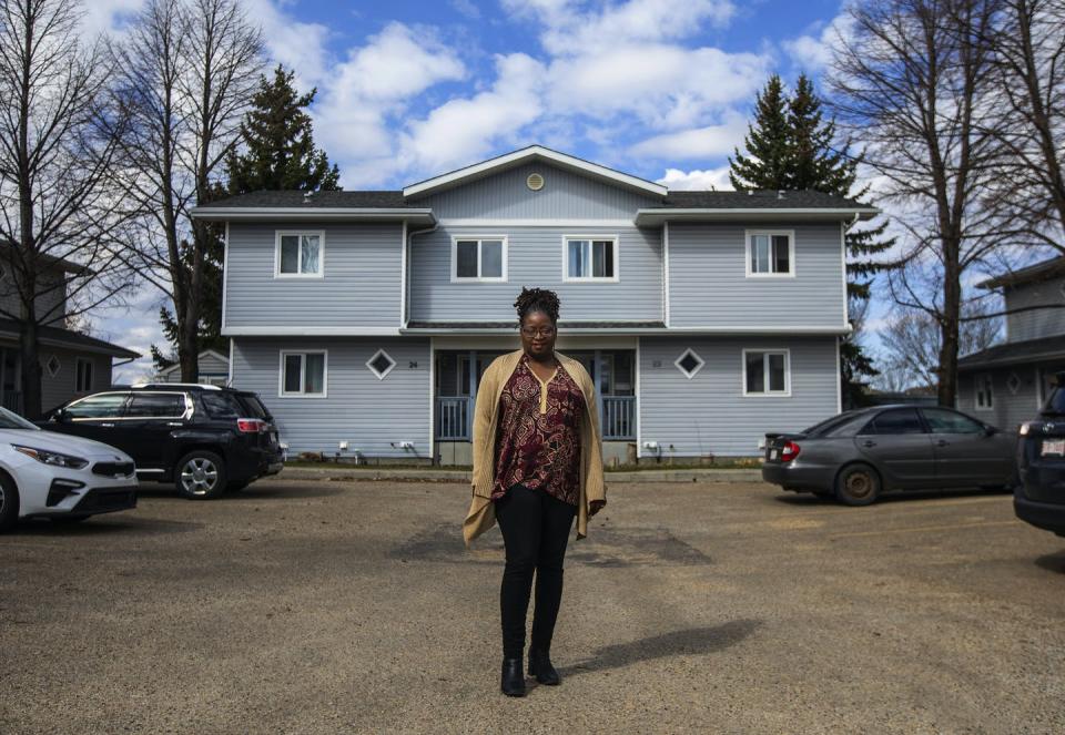 <span class="caption">A resident is pictured outside their housing co-operative in Sherwood Park, Alta., in April 2022. Co-operative housing is one way for people to find affordable housing in Canada’s big cities.</span> <span class="attribution"><span class="source">THE CANADIAN PRESS/Jason Franson</span></span>