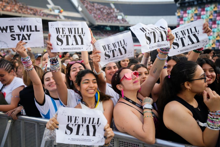 Fans get revved as they wait for the start of the Taylor Swift: The Eras Tour concert, in Buenos Aires, Argentina, Thursday, Nov. 9, 2023. (AP Photo/Natacha Pisarenko)