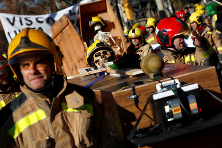 Firemen take part in a protest in front of Catalunya's Parliament in Barcelona, Spain, December 20, 2018. REUTERS/Juan Medina