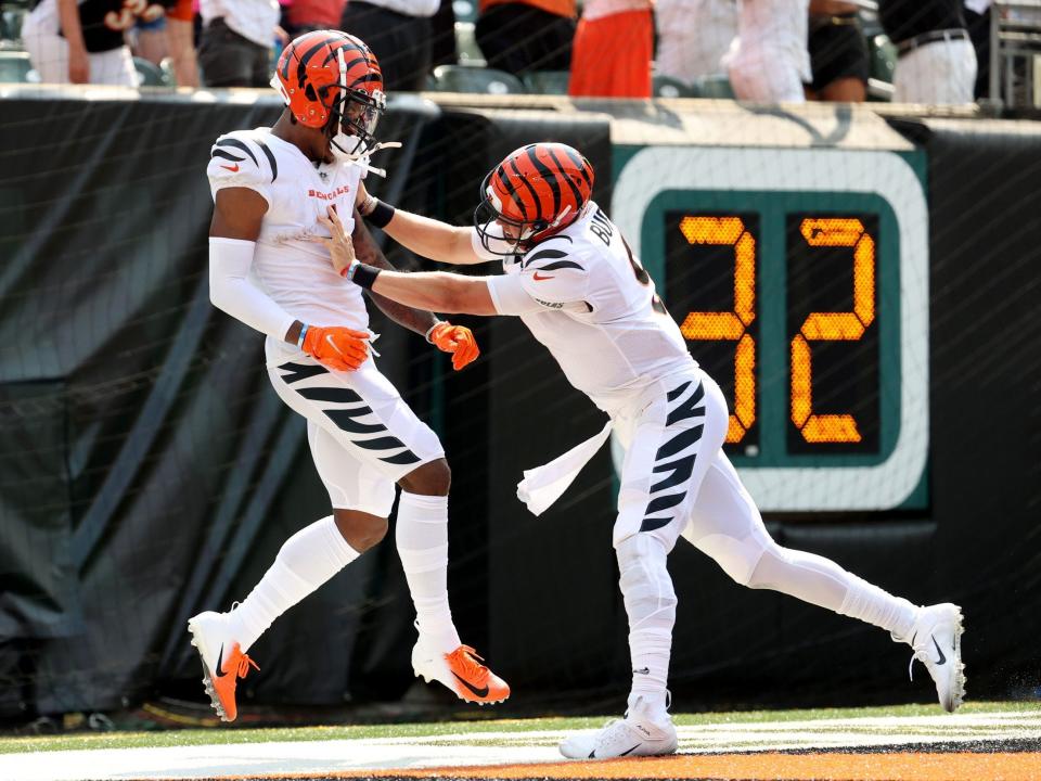 Ja'Marr Chase and Joe Burrow celebrate a touchdown.