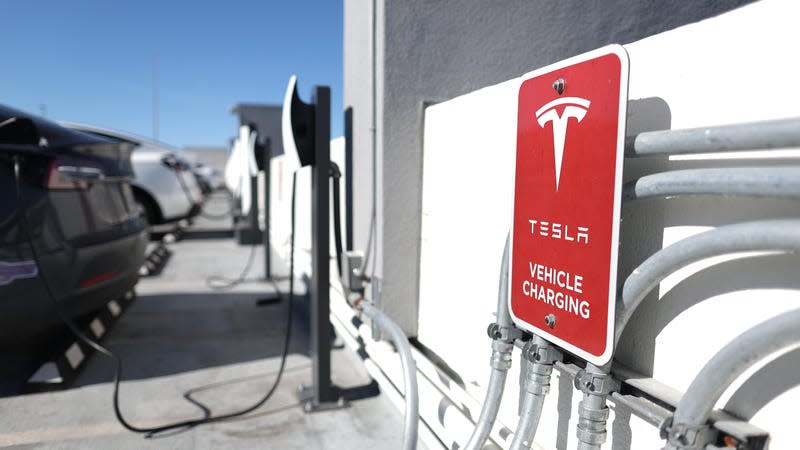 Tesla cars recharge at a Tesla Supercharger station on February 15, 2023 in San Francisco, California. Electric car company Tesla is partnering with the U.S. federal government to expand electric vehicle charging infrastructure in the United States. Tesla announced plans to open an estimated 7,500 of its Tesla Superchargers in the country to all brands of electric vehicles by the end of 2024