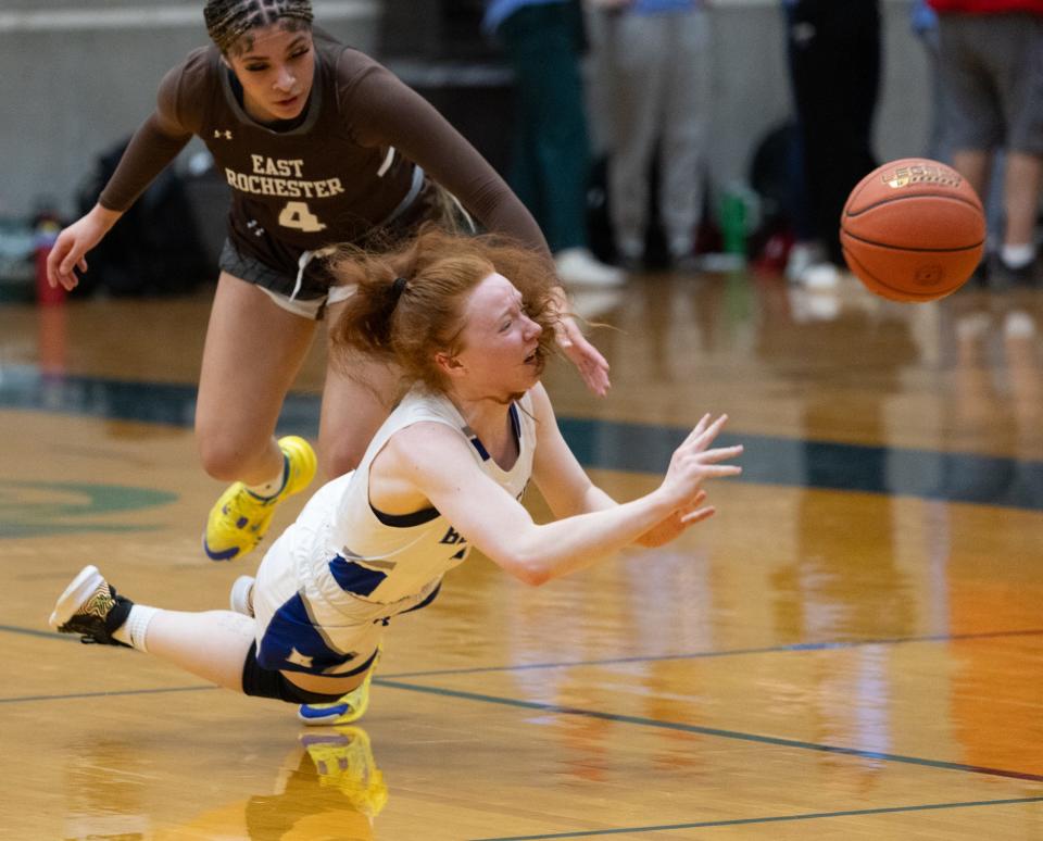 Bloomfield's Annie Dodge is tripped up.