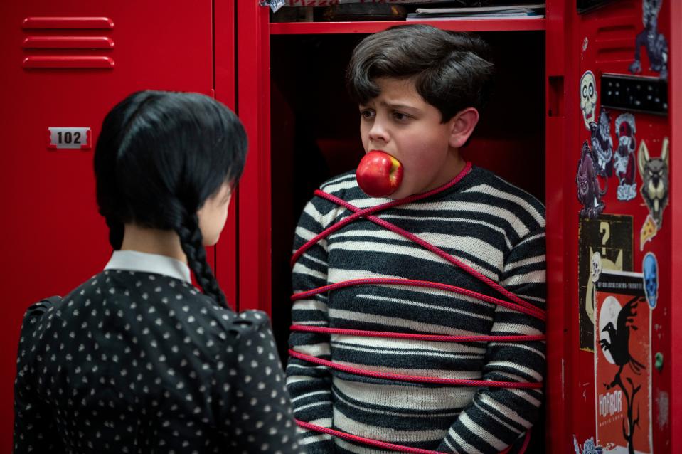 (L to R) Jenna Ortega as Wednesday Addams and Issac Ordonez as Pugsley Addams in episode 101 of ‘Wednesday.’