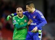 Football Soccer - Liverpool v Sunderland - Barclays Premier League - Anfield - 6/2/16 Sunderland's Vito Mannone celebrates with Wahbi Khazri after the game Action Images via Reuters / Carl Recine Livepic