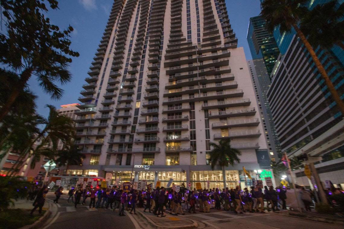 Janitors in South Florida walks the downtown street in protest on Wednesday February 21st., 2024 in Downtown Miami. Strike could disrupt services for thousands of office tenants & companies throughout South Florida New study shows janitors are mostly immigrant women, lowest paid in the country.