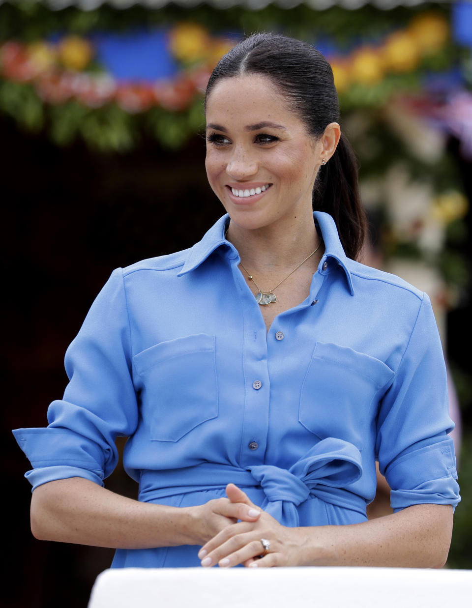 Meghan, Duchess of Sussex smiles during a visit to Tupou College in Tonga, Friday, Oct. 26, 2018. Prince Harry and his wife Meghan are on day 11 of their 16-day tour of Australia and the South Pacific. (AP Photo/Kirsty Wigglesworth, Pool)