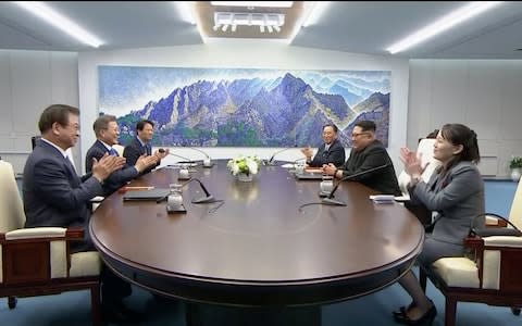 South Korean President Moon Jae-in and North Korean leader Kim Jong Un attend the inter-Korean summit at the truce village of Panmunjom - Credit: Reuters