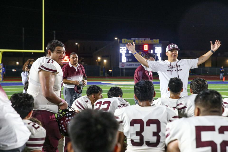 Mathis head coach Trae Stevens tells the team they have heart after their, 28-22, victory over Odem after the game Thursday, Sept. 8, 2022, at Owl Stadium in Odem, Texas.