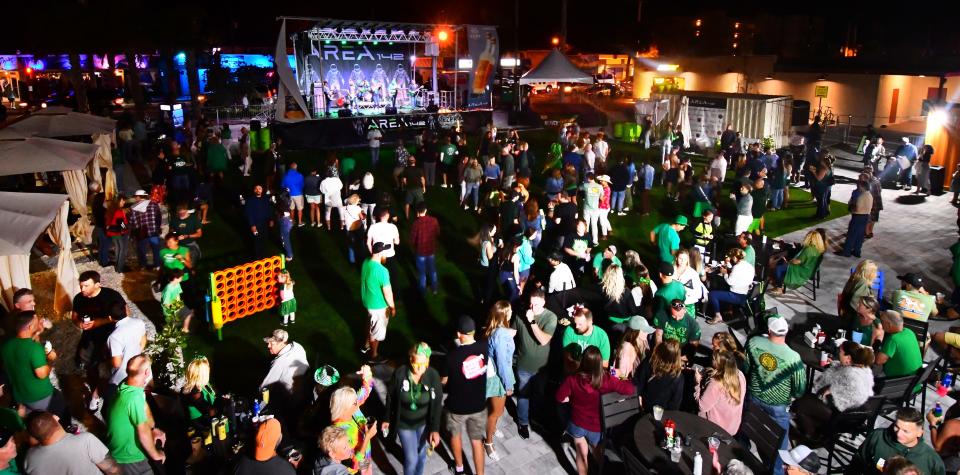 Area 142 and the rock-dance band Alter Ego draws a large Friday night crowd to downtown Cocoa Beach on March 17, during a tourist-heavy combination of spring break, St. Patrick’s Day and Friday Fest.