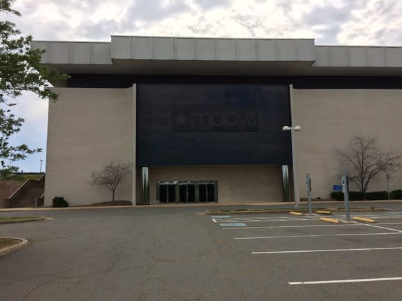 The exterior of a vacant former Macy's store.
