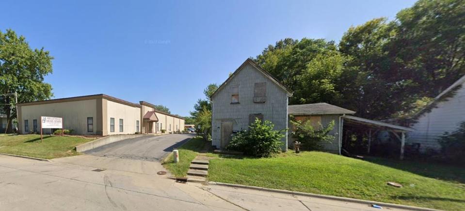 Belleville School District 118 bought the boarded-up, two-story home at 1326 E. Main St., right, from the limited-liability company Topstone Inv CAH 1 two years ago and demolished it. At left is the district’s Head Start center. Google Maps