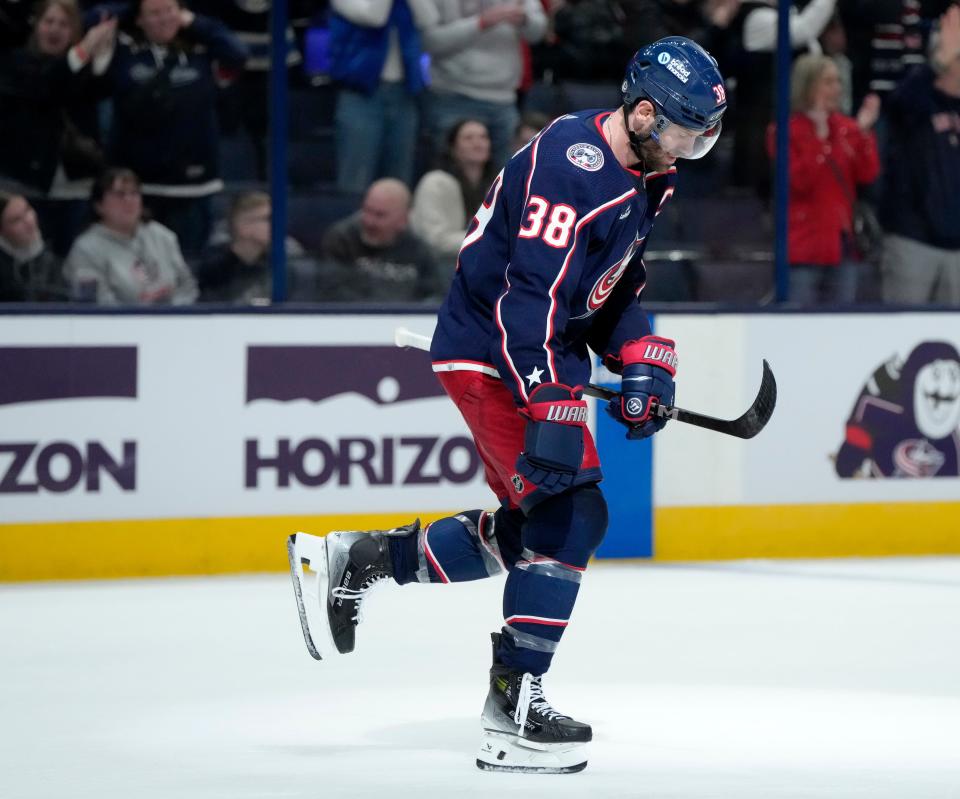 Feb. 10, 2024; Columbus, Ohio, USA; 
Columbus Blue Jackets center Boone Jenner (38) scores a goal during the third period of a hockey game against the Tampa Bay Lightning at Nationwide Arena on Saturday. The Lightning won the game 4-2.