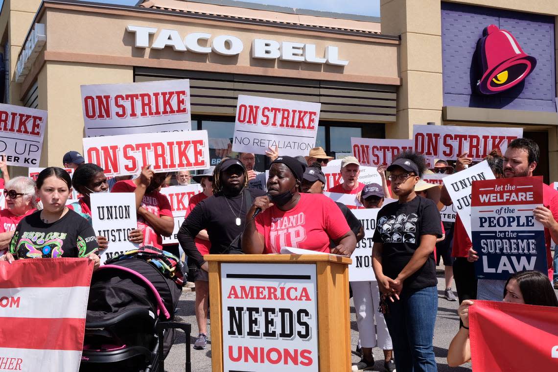 Fran Marion, an employee at the Taco Bell at 8215 Wornall Road, spoke to a crowd about the working conditions and low pay that led her to walk off the job Thursday. Katie Moore
