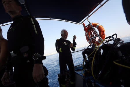 Ray Woolley, pioneer diver and World War 2 veteran, prepares his gear before breaking a new diving record as he turns 95 by taking the plunge at the Zenobia, a cargo ship wreck off the Cypriot town of Larnaca, Cyprus September 1, 2018. REUTERS/Yiannis Kourtoglou