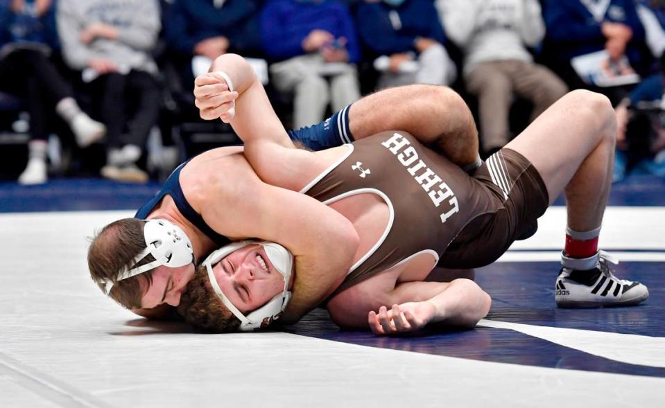 Penn State’s Max Dean controls Lehigh’s J.T. Davis in the 197 lb bout during the match on Sunday, Dec. 5, 2021 at Rec Hall.