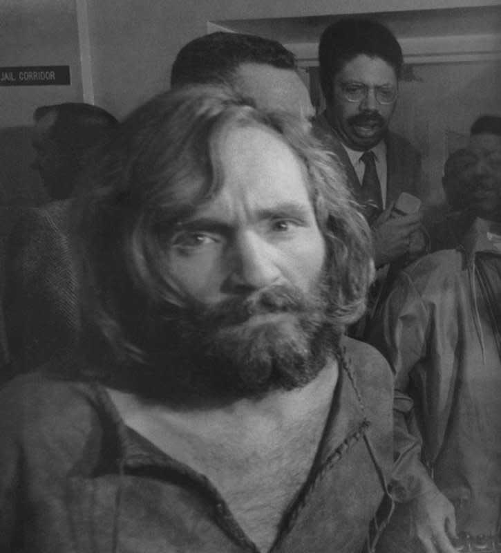 Charles Manson is taken into custody at the Los Angeles jail in 1969 after being charged with the murders of actress Sharon Tate and her unborn child along with several of her friends. On March 29, 1971, Manson and three followers were sentenced to death in the slayings in Los Angeles. File Photo by Ernie Schwork/UPI