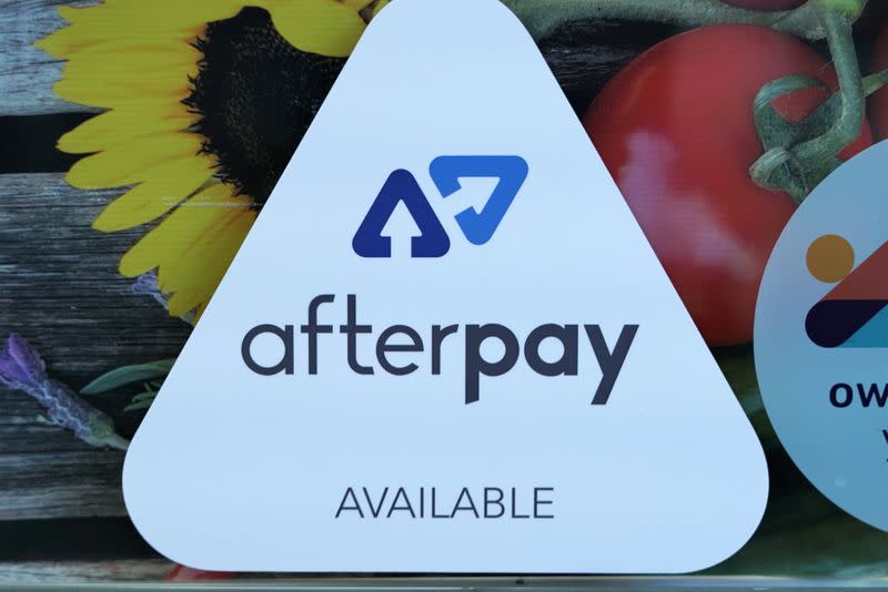 FILE PHOTO: A logo for the company Afterpay is seen in a store window in Sydney