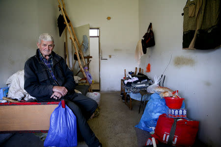 Bosnian Serb Rasko Kovacevic, an internally displaced person from Gracanica, sits in his room at a reception center Kladari Donji where IDPs live, near Modrica, Bosnia and Herzegovina, October 1, 2018. REUTERS/Dado Ruvic