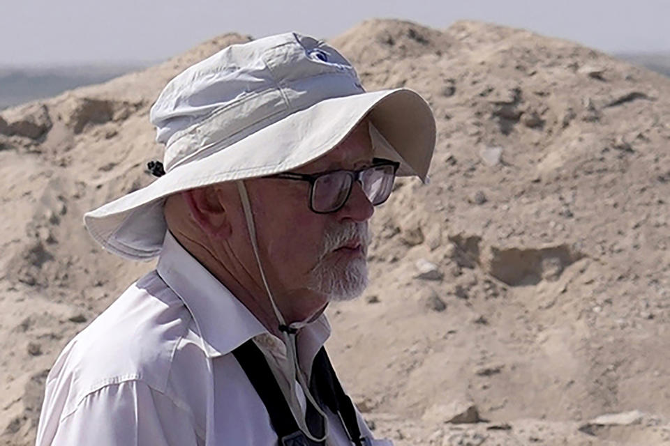 FILE - Peter Hellyer, visits an ancient Christian monastery on Siniyah Island in Umm al-Quwain, United Arab Emirates, Thursday, Nov. 3, 2022. Peter Hellyer, a British born writer with wide-ranging interests who spent nearly five decades chronicling the history, natural beauty and modern transformation of the United Arab Emirates, has died at the age of 75, local media reported Monday, July 3, 2023. (AP Photo/Kamran Jebreili, File)