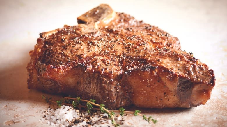 grilled steak with garnish