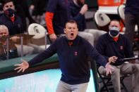 Illinois head coach Brad Underwood reacts after a play during the first half of an NCAA college basketball game against Michigan State, Tuesday, Feb. 23, 2021, in East Lansing, Mich. (AP Photo/Carlos Osorio)