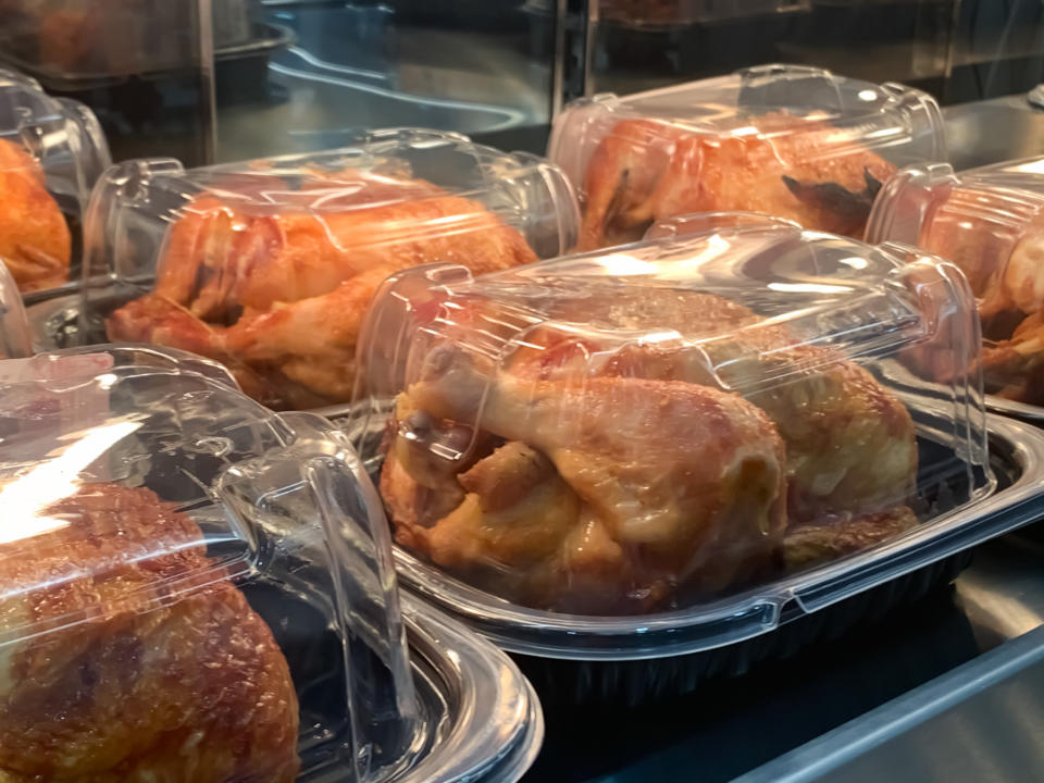 Whole cooked chickens on a display