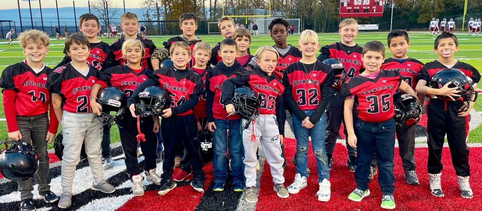 Wayne Highlands Youth Football Organization players were special guests of the Honesdale varsity team at a recent home game on the new artificial turf.