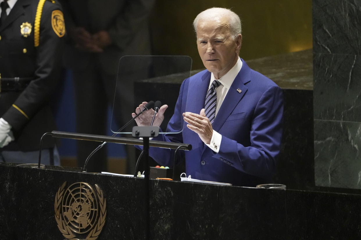 President Biden stands at a podium at the U.N.
