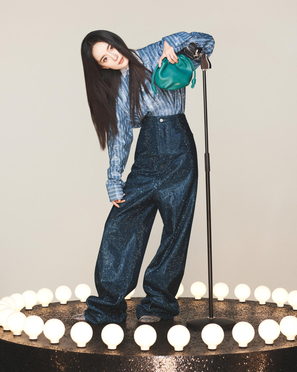 Loewe global brand ambassador Yang Mi carrying an Emerald Green Flamenco Purse Mini.