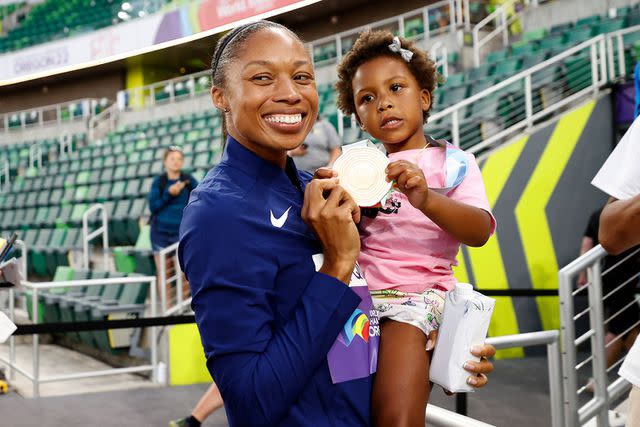 <p>Steph Chambers/Getty</p> Allyson Felix and daughter Camryn