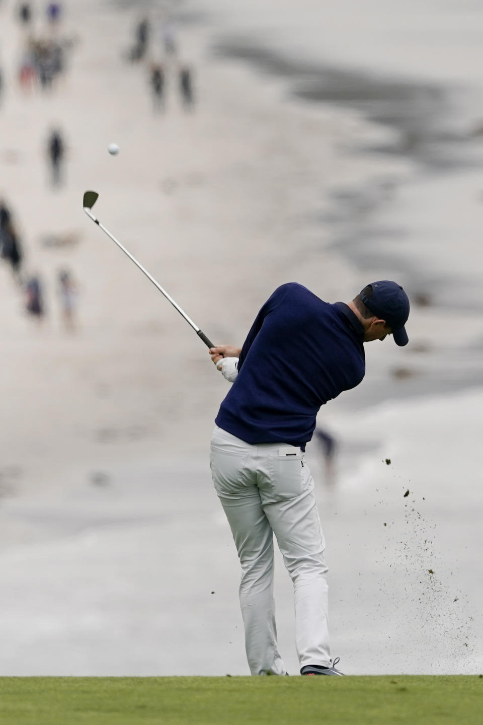 Rory McIlroy, of Northern Ireland, hits from the fairway on the ninth hole during the third round of the U.S. Open golf tournament Saturday, June 15, 2019, in Pebble Beach, Calif. (AP Photo/David J. Phillip)