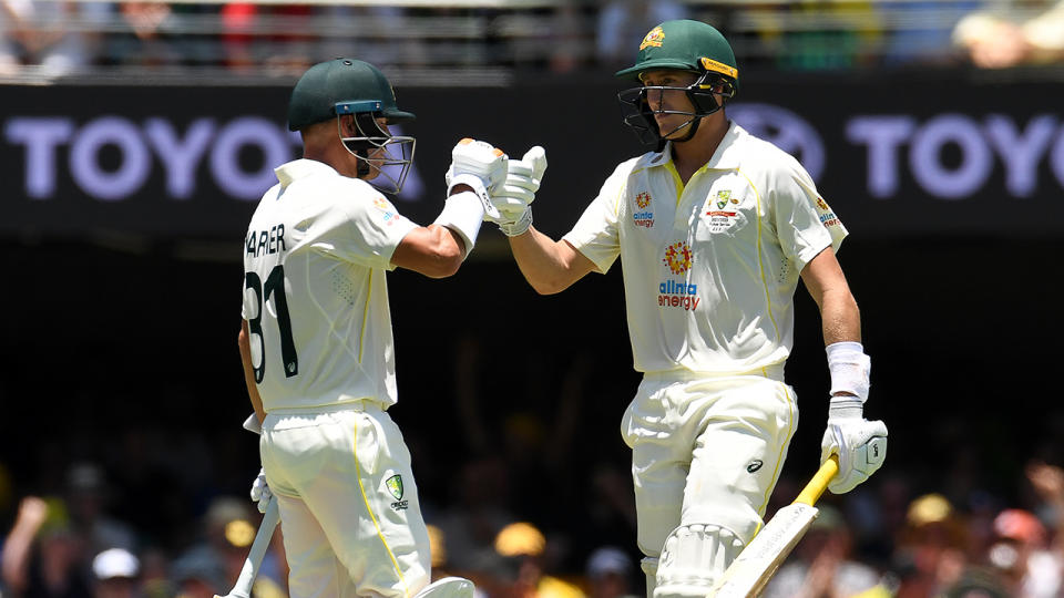 David Warner and Marnus Labuschagne have batted Australia into a dominant position on day two of the first Ashes Test in Brisbane. (Photo by Albert Perez - CA/Cricket Australia via Getty Images)