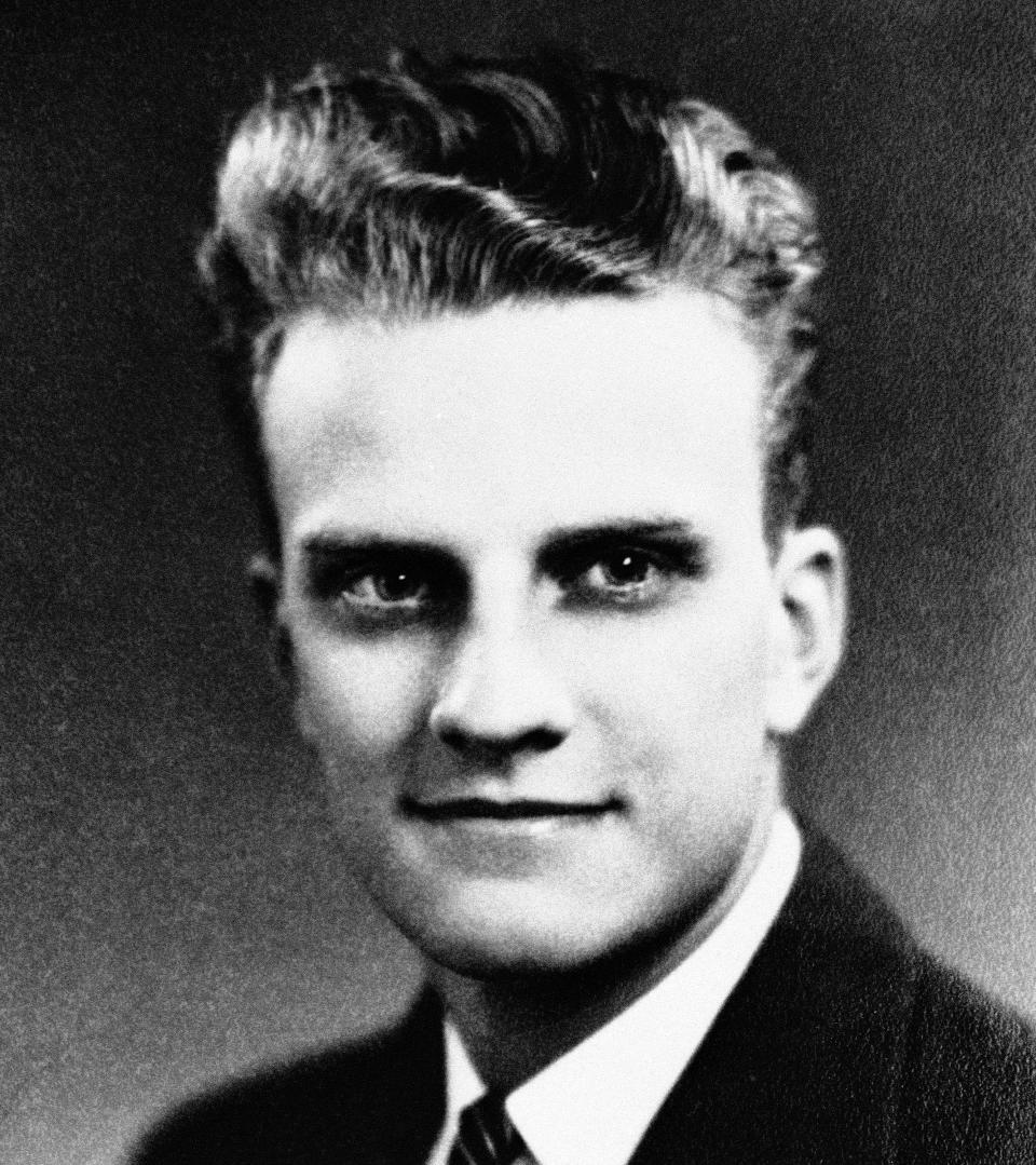 <p>William “Billy” Graham at age 17, at his graduation from Charlotte High School in June 1935. He had already embraced religion at a local revival meeting and decided that he would focus on the pulpit rather than the baseball diamond. (Photo: AP) </p>