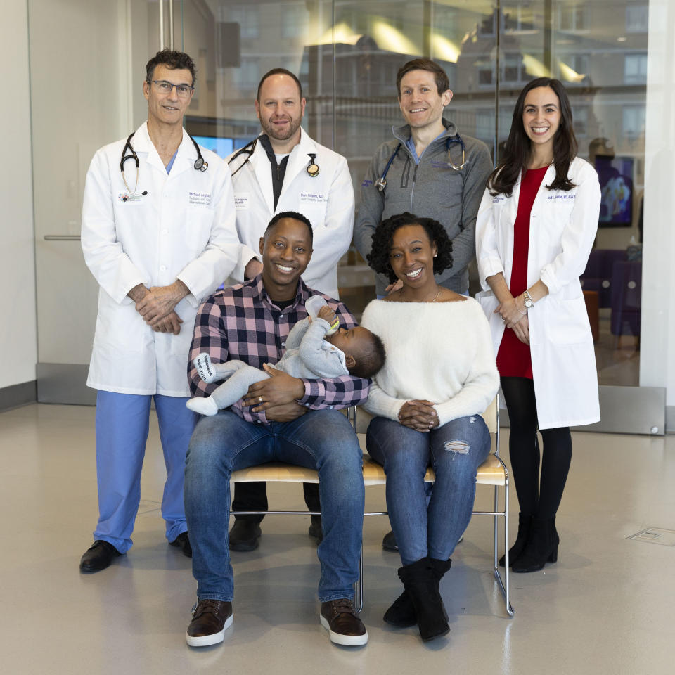 Dr. Michael Argilla, Dr. Dan Halpern, Dr. Adam Small, Jodi Feinberg, nurse practitioner with patient Marian Smith and husband Aleahue Abu and baby boy Idenara Abu. (Haley Ricciardi / Courtesy NYU Langone Health)