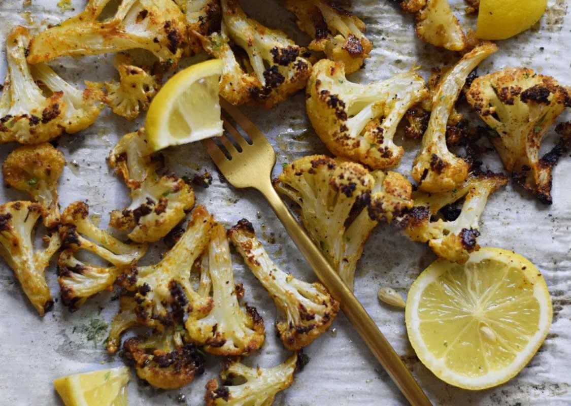 <p>My Pretty Brown Fit + Eats</p><p>This roasted cauliflower tastes like sunshine! Crispy cauliflower with lemon and garlic with bursts of fun flavors.</p><p><strong>Get the recipe: <a href="https://www.myprettybrownfit.com/lemon-pepper-roasted-cauliflower/" rel="nofollow noopener" target="_blank" data-ylk="slk:Lemon-Pepper Roasted Cauliflower;elm:context_link;itc:0;sec:content-canvas" class="link rapid-noclick-resp">Lemon-Pepper Roasted Cauliflower</a></strong></p>