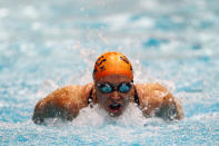 INDIANAPOLIS, IN - MARCH 29: Ariana Kukors swims in the women's 100 meter butterfly finals during day one of the 2012 Indianapolis Grand Prix at the Indiana University Natatorium on March 29, 2012 in Indianapolis, Indiana. (Photo by Dilip Vishwanat/Getty Images)