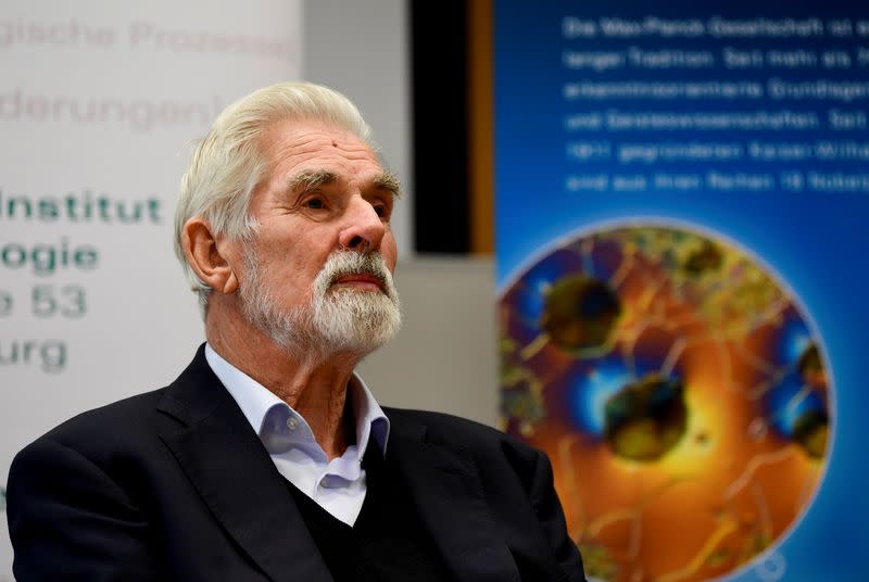 FILE PHOTO: German Klaus Hasselmann speaks to the media after winning the 2021 Nobel Prize in Physics