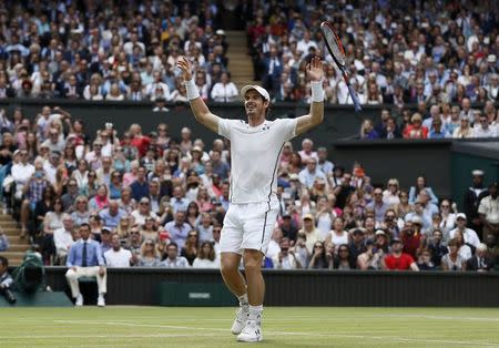 Britain Tennis - Wimbledon - All England Lawn Tennis & Croquet Club, Wimbledon, England - 10/7/16 Great Britain's Andy Murray celebrates winning the mens singles final against Canada's Milos Raonic REUTERS/Stefan Wermuth