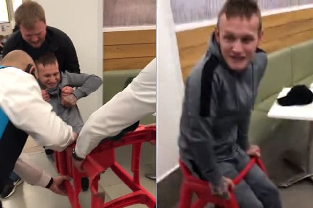 Hilarious moment man is rescued from child's high chair