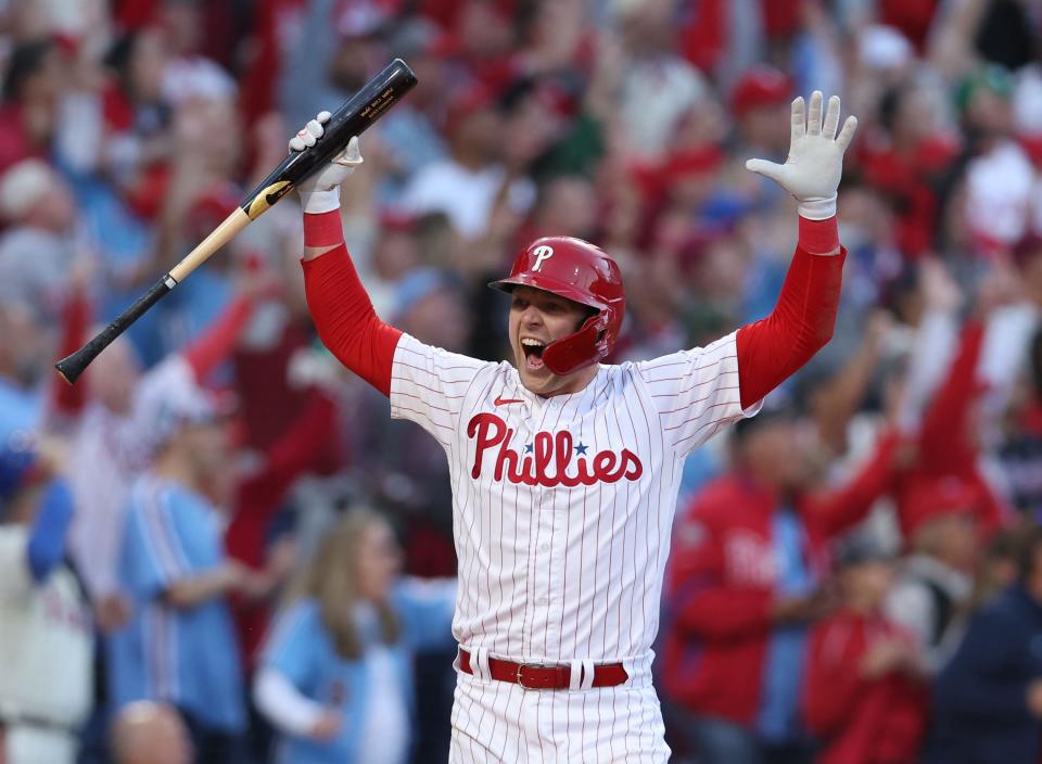 Rhys Hoskins celebrates his three-run homer in Game 3 of the 2022 NLDS against Atlanta.