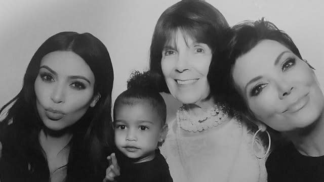 Does North West get her serious side from her mom, Kim Kardashian? The adorable 2-year-old posed for some family pictures at a surprise high school graduation party that radio host (and <em>Keeping Up With the Kardashians </em>executive producer) Ryan Seacrest threw for her aunts Kendall and Kylie Jenner. And you could say little Nori looks a lot like her mom, lip pout and all! Just take a look at the four generations of Kardashians in this photo, including Kim, her mom, Kris Jenner, and Kris' mom, Mary Jo Campbell. <strong> WATCH: North West Adorably Dances to 'Black Widow' </strong> And even though Kris and Mary Jo are all smiles, Kim and North have on their serious faces. In fact, when her mom, grandma and great-grandma all give her a kiss, she still chooses not to crack a smile! <strong> PICS: North West's 22 Cutest Photos </strong> North's father, Kanye West, joined his wife for a non-smiling snap too. He actually explained why he won't smile back in January at the The Daily Front Row's First Annual Fashion Los Angeles Awards. "Back when I was working on <em>Yeezus</em>, I saw this book from the 1800s and it was velvet-covered with brass and everything. I looked at all these people's photos and they look so real and their outfits were incredible and they weren't smiling," he told the crowd. "The paparazzi always come up to me, 'Why you not smiling?' and I think, not smiling makes me smile… When you see paintings in an old castle, people are not smiling cause it just wouldn't look as cool." <strong> WATCH: Sad Kanye Turns Happy In a Second! </strong> But ultimately, you could say that his wife brings out the best in him. There's that smile! It's no wonder we'll lose all hope in love if Kim and Kanye divorce. Check out the video below to see 10 more that restore our faith in love.