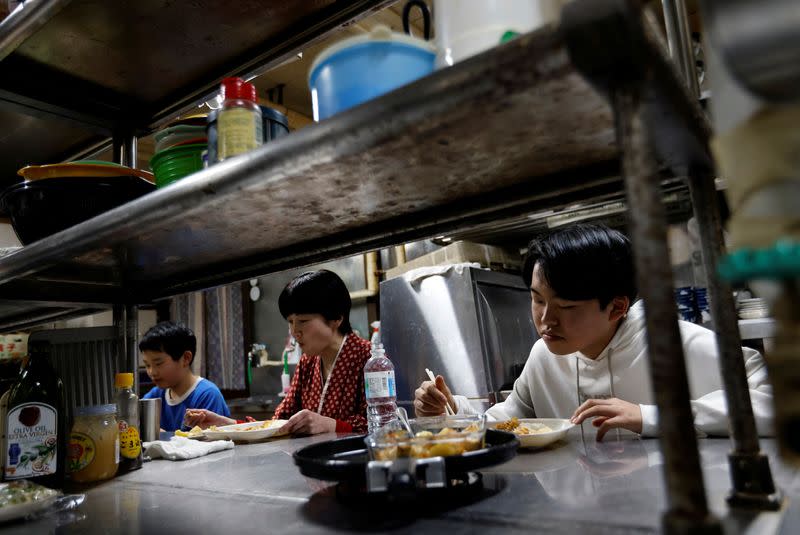 The Wider Image: Last students graduate: School closures spread in ageing Japan