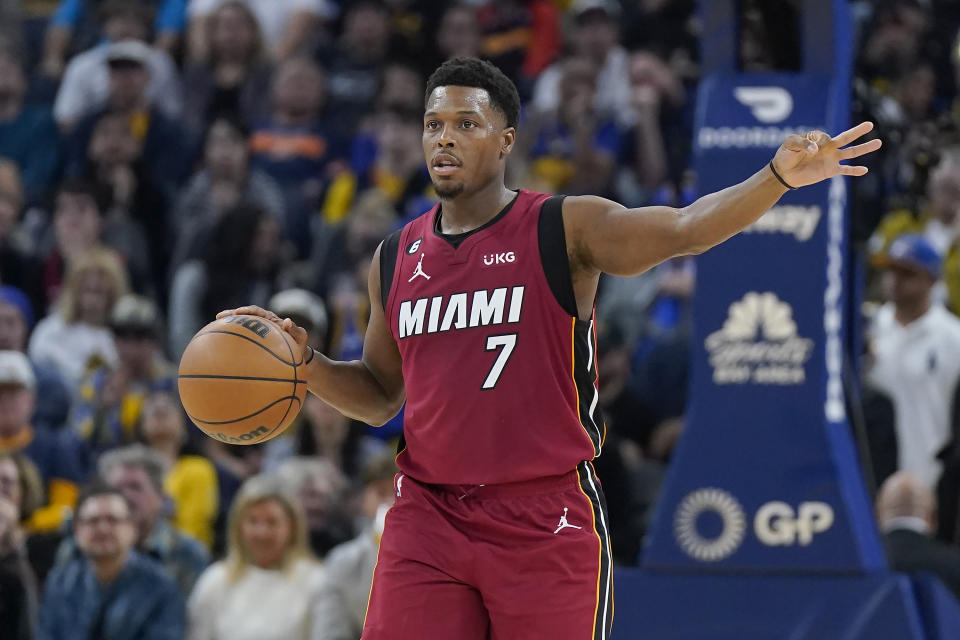 Miami Heat guard Kyle Lowry (7) brings the ball up the court against the Golden State Warriors during the first half of an NBA basketball game in San Francisco, Thursday, Oct. 27, 2022. (AP Photo/Jeff Chiu)