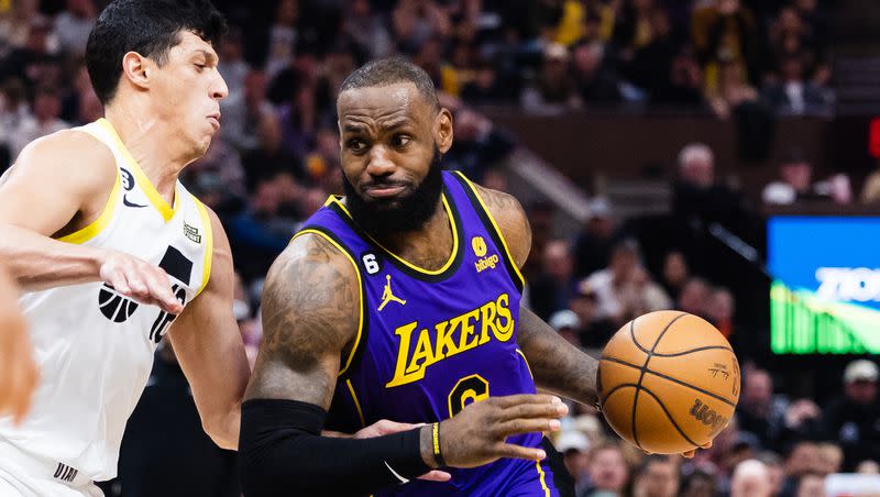 Los Angeles Lakers forward LeBron James (6) drives the ball against Utah Jazz forward Simone Fontecchio (16) during an NBA basketball game between the Utah Jazz and Los Angeles Lakers at Vivint Arena in Salt Lake City on April 4, 2023.