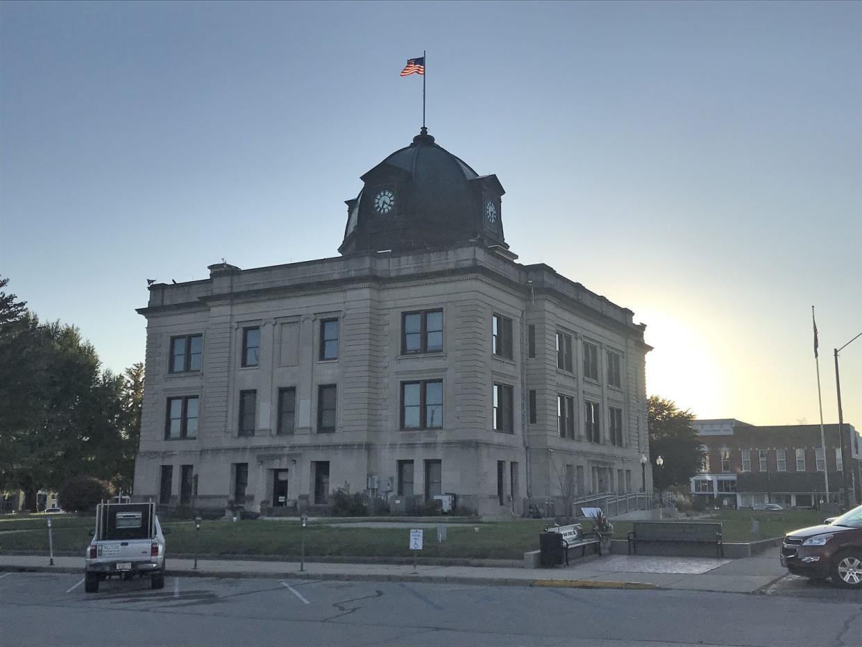 The Owen County Courthouse, where County Council and Commissioners meetings are held, is shown as the sun begins to set.