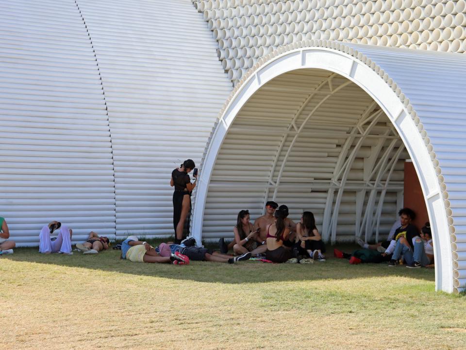 coachella 2022 people sitting in shade