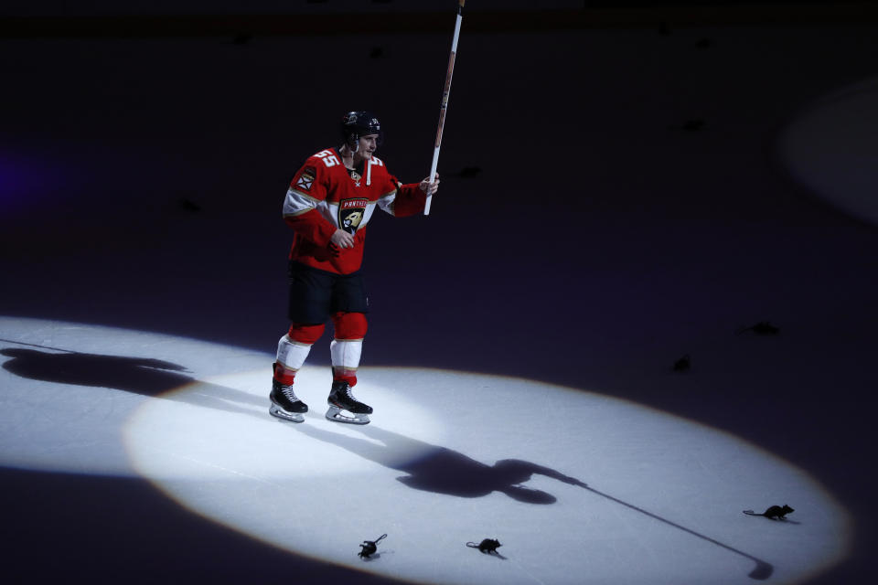 Florida Panthers' Noel Acciari waves at the crowd after the Panthers defeated the Dallas Stars 7-4 during an NHL hockey game Friday, Dec. 20, 2019, in Sunrise, Fla. Acciari scored a hat trick. (AP Photo/Luis M. Alvarez)