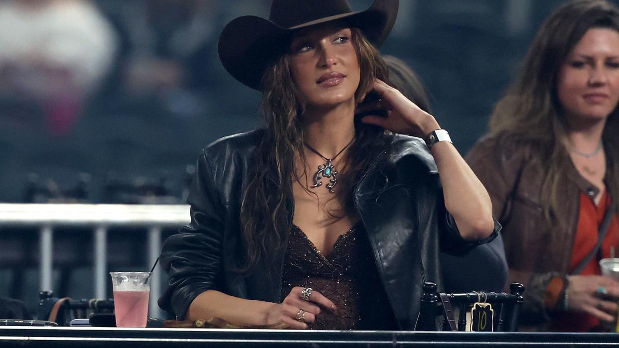 Bella Hadid looks on during The American Performance Horseman by Teton Ridge at Globe Life Field on March 08, 2024 in Arlington, Texas. (Photo by Rob Carr/Getty Images for Teton Ridge)